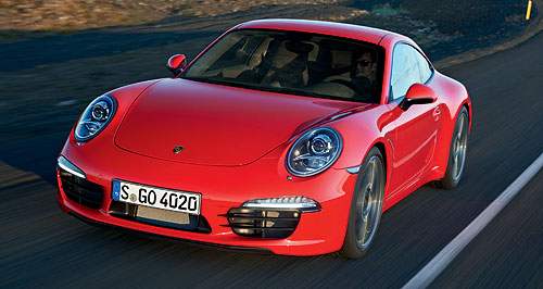 Porsche 911 manual shifts up a gear