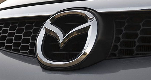 Mazda posts huge loss