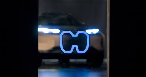 BMW outs battery-electric Vision iNext in teasers