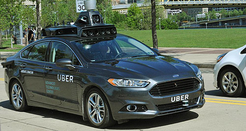Uber reveals driverless prototype